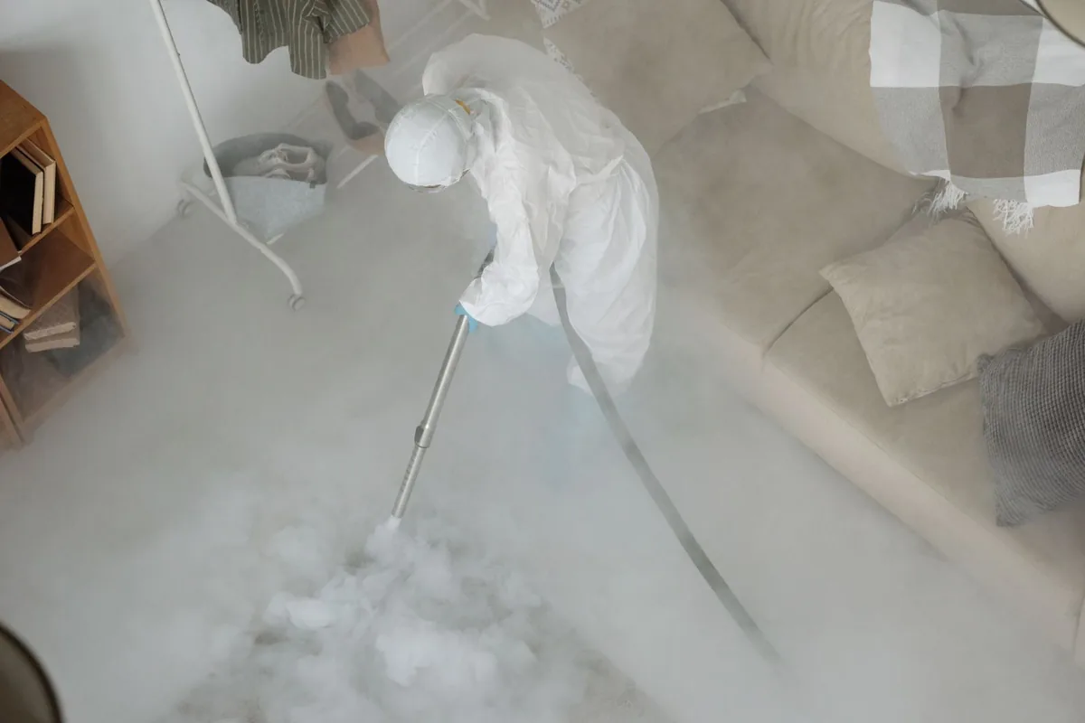 Biohazard cleanup technician in protective equipment, Hanover, OH